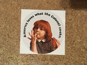 VINTAGE KFC STICKER AMERICA LOVES WHAT THE COLONEL COOKS / WRONGWAY052 - Picture 1 of 2
