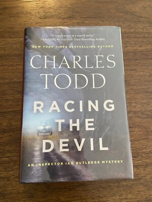 SIGNED Racing the Devil by Charles Todd 1st Printing First Edition 2017 HCDJ - Image 1 of 4