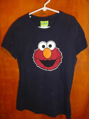 CAMISA NIÑA TICKLE ME ELMO-TALLA PEQUEÑA Y X-GRANDE Foto 1 de 3