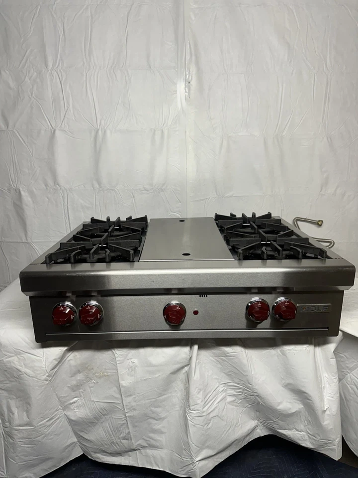 Wolf 36” Range Top - RT364C 4 Quemadores + Plancha Perillas Rojas Gas Natural Foto 1 de 4
