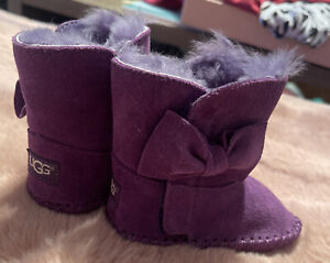 UGG Baby size 1 purple bow booties/slippers- great condition