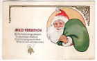 ANTIQUE CHRISTMAS Postcard      SANTA CLAUS HOLDING GREEN TOY SACK