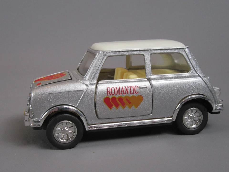 D652 Tai Cheong Toys Mini Cooper Mk I Romantic Heart Silver 1/34 Friction Ok - Image 1 of 4