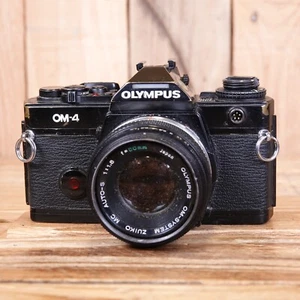 Cámara fotográfica Olympus OM-4 35 mm + 50 mm F1,8 - repuestos o reparación - Imagen 1 de 7