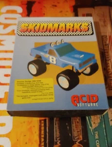 Skidmarks (Acid Soft 1993) Commodore Amiga (4 discos, manual, caja) funciona alt cove - Imagen 1 de 3