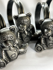 8 Napkin  rings  Metal Brushed nickel finish teddy bears.