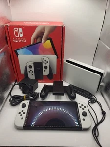 Nintendo Switch modello OLED bianco con accessori in scatola - Foto 1 di 18