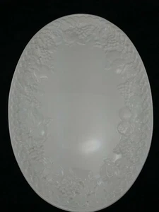 Plato para servir blanco ovalado de 17,5" Estee Ceramiche para Williams uva granada - Imagen 1 de 11
