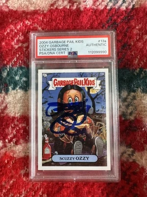Ozzy Osbourne Signed 2004 Garbage Pail Kids ‘Scuzzy Ozzy’ Card (PSA & PSA/DNA) - Image 1 of 4