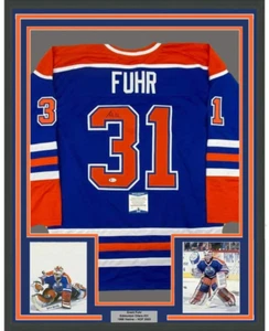 FRAMED Autographed/Signed GRANT FUHR 33x42 Edmonton Blue Jersey Beckett BAS COA - Picture 1 of 2