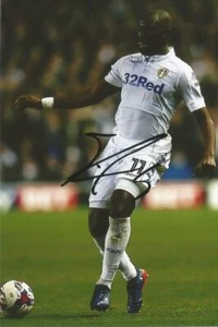 LEEDS UNITED* SOULEYMANE DOUKARA SIGNED 6x4 ACTION PHOTO+COA - Picture 1 of 1