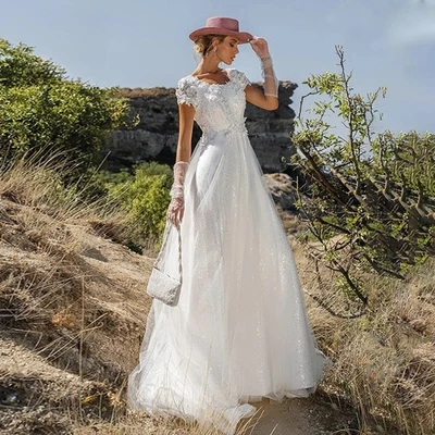 A-Line Wedding Dress Sexy Scoop Backless Appliques Sequined Beach Bridal Gowns - Image 1 of 4