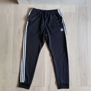 Adidas Adicolor Classics Primeblue Superstar Trainingshose Herren L schwarz - Bild 1 von 5