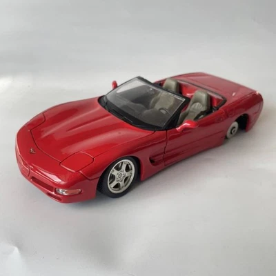 Necessita di riparazione 1/18 Burago Chevrolet Corvette C5 Burago Chevrolet... - Immagine 1 di 4