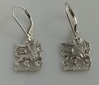 sterling silver pair of  symbolic lion of judah dangily èarrings on a sterling 