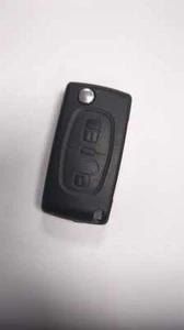 ORIGINAL PEUGEOT 2 TASTEN FERNBEDIENUNG KLAPPSCHLÜSSELANHÄNGER GETESTET & FUNKTIONSFÄHIG E33CI002 - Bild 1 von 5