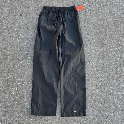 Pantalones cortavientos vintage Nike de nailon M negros stock muerto parte inferior abierta años 90 Y2K ACG Foto 1 de 4