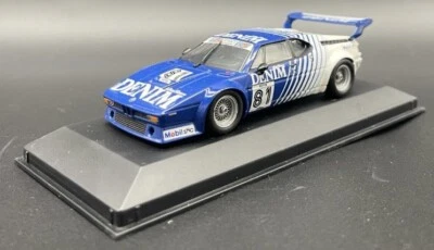 Minichamps 1/43 BMW M1 “Denim” H. Heyer 430802581 - Image 1 of 4