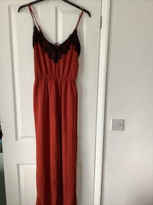 NEW ORANGE SATIN BELTED JUMPSUIT SIZE 12 BLACK LACE TRIM FROM LITTLE MISTRESS - Picture 1 of 5