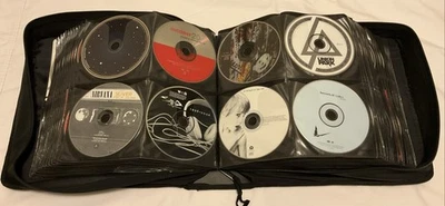 256 CDs in a Case Logic Binder Rock/Metal Lot Megadeth, Motley Crue, Rush, Tool - Imagem 1 de 4