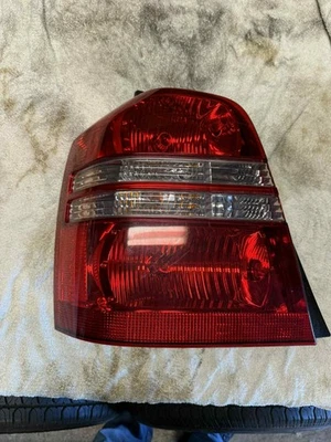 TOYOTA HIGHLANDER 2000-2003 luz trasera lámpara de freno unidad bombillas lado del conductor OEM Foto 1 de 3