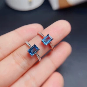 Anillo de compromiso solitario de topacio azul corte esmeralda de 1 quilate para mujer cubierta de oro de 14 quilates plateado - Imagen 1 de 10