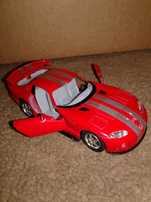 Kinsmart Chrysler Viper Cruiser rojo usado Foto 1 de 4