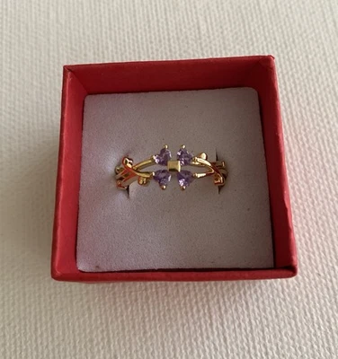 Anillo ajustable de acero inoxidable con flor de circonita cúbica de cristal púrpura, diseño simple Foto 1 de 4