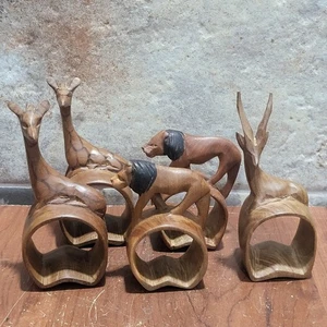 Fünf handgeschnitzte afrikanische Safari Tier Holz Serviettenringe Giraffe Löwe Antilope - Bild 1 von 10