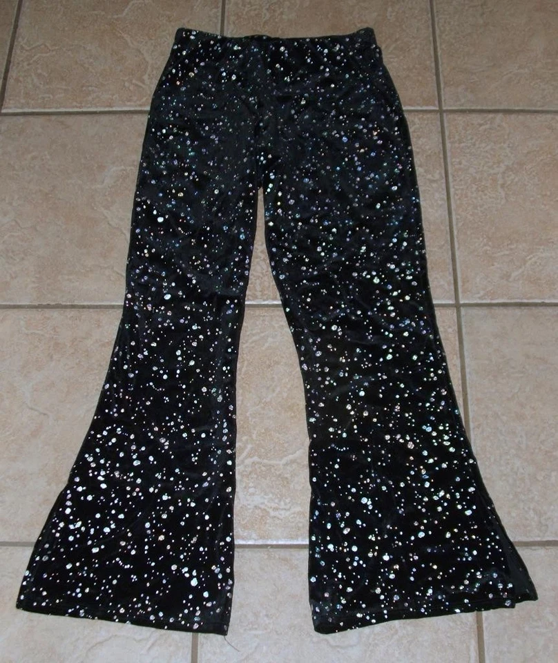 Pantalones acampanados de terciopelo suave cintura elástica talla pequeña lunares plateados brillantes negros y brillantes Foto 1 de 3