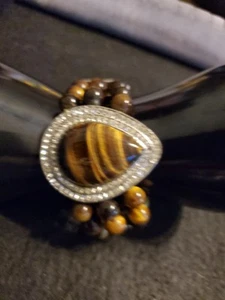 TIGERS EYE BRACELET 3 ROWS OF TIGERS EYE W A HUGE PEAR SHAPED TIGER EYE SOL - Picture 1 of 3