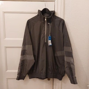 Giacca uomo Adidas versione blu Silver TT taglia XL  - Foto 1 di 9