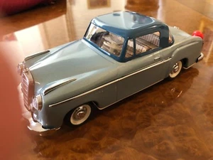 Vintage Schuco Rollfix 1085 | Mercedes-Benz 220 SE | Momentum Drive Tin Toy - Picture 1 of 12