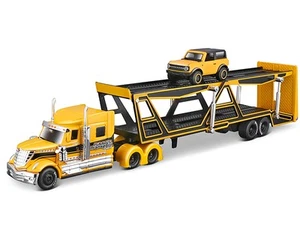 Trasportatore auto aperto International Lonestar e Ford Bronco Badlands 2021 1/64 - Foto 1 di 3