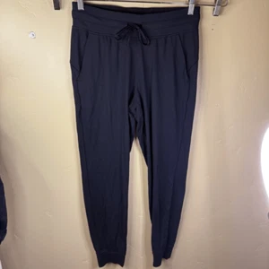 Lululemon On the Fly Jogger taglia 8 donna nero 29" cucitura interna tempo libero attivo - Foto 1 di 9