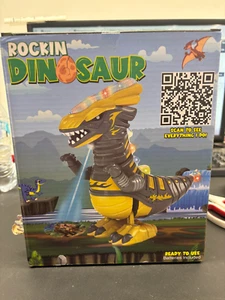 (Red or Black) Rockin Dinosaur Dances, Sings, Lights up, & Projects Images - Picture 1 of 2