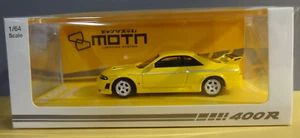 KYOSHO - YELLOW - NISSAN NISMO 400R - W/ ACRYLIC DISPLAY CASE - Picture 1 of 3
