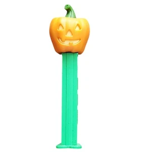 Dispensador PEZ Cabeza de Calabaza Vintage Halloween Hecho en Hungría Tallo Verde - Imagen 1 de 10