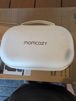 Extractor de leche portátil acogedor para mamá Foto 1 de 2