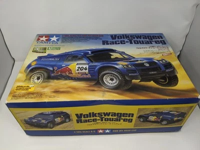Tamiya 58324 Volkswagen Race-Touareg Red Bull In Box Partially Built Never Run - Image 1 of 4