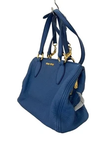 Bolso de hombro de cuero bidireccional Miu Miu azul RN0620 usado - Imagen 1 de 6