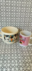 Eine kleine Tasse Minnie und eine große Tasse Mickey  - Bild 1 von 4