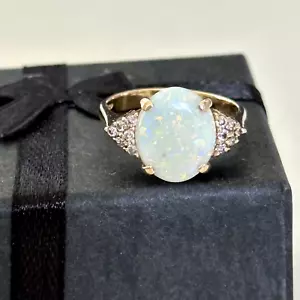 Anillo de oro amarillo de 14 quilates con ópalo de fuego blanco y diamantes para dama talla 6,5 - Imagen 1 de 14