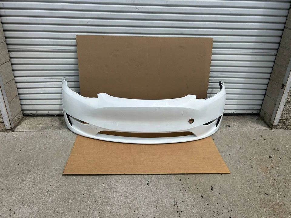 Cubierta de parachoques delantero 22-24 Tesla modelo Y 1687994-TX-A OEM blanca con arañazos Foto 1 de 4