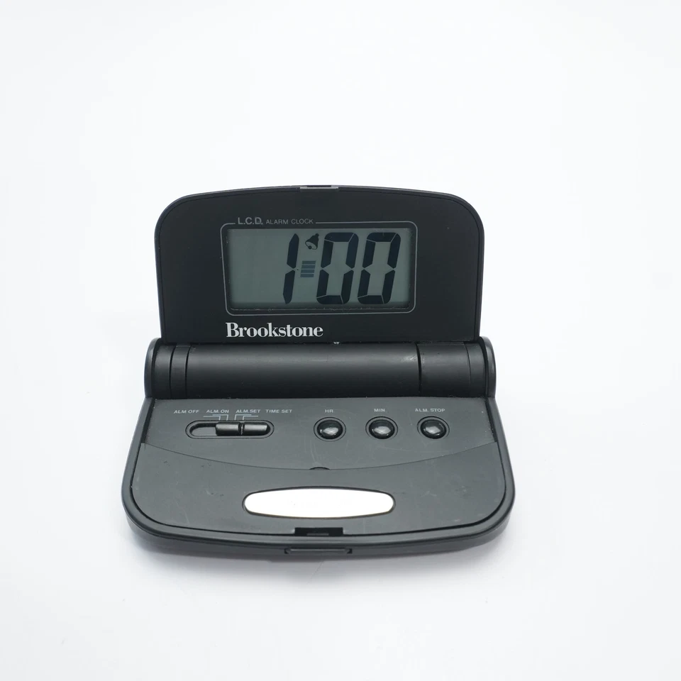 Brookstone Portable Travel LCD Alarm Clock Folding Compact - Image 1 of 4