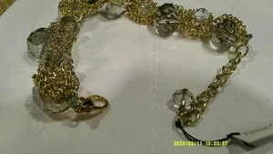 Pulsera y pendientes envueltos en cadena de color dorado - Imagen 1 de 6