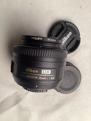 Lente Nikon NIKKOR 35 mm f/1,8 AF-S DX M/A RF + filtro Foto 1 de 4