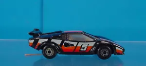 MB-321-1985 MATCHBOX LAMBORGHINI COUNTACH LP 500S #5 NERO CON STRISCE COLORATE - Foto 1 di 6