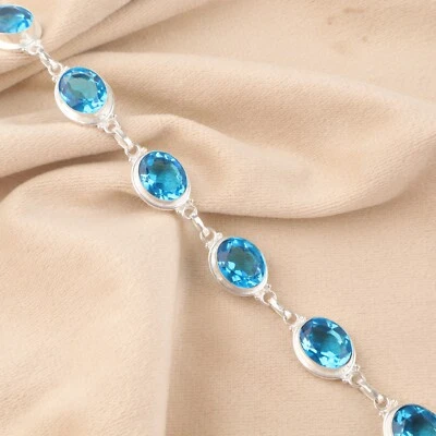 Brazalete de cadena de plata de ley 925 con piedras preciosas de topacio azul suizo natural para mujer Foto 1 de 4