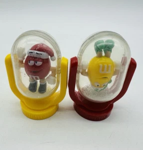 M&M Candy Tube Santa Rojo y Amarillo Abatible Vacío Juguete de Navidad 2010 Coleccionable - Imagen 1 de 5